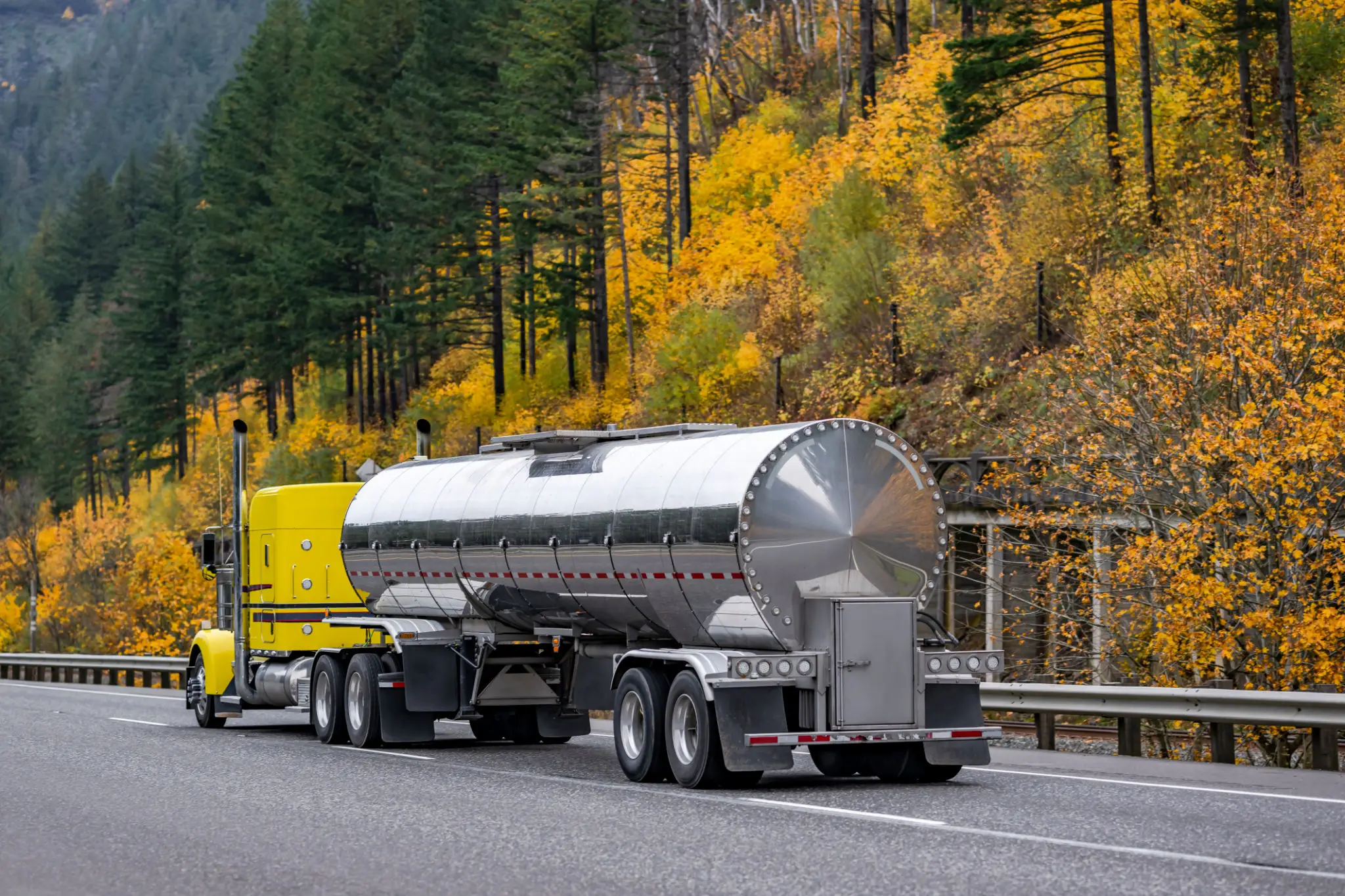 An industrial-grade, heavy-duty tanker truck used for transloading services.